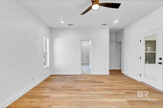 unfurnished bedroom with baseboards, visible vents, light wood-style floors, and recessed lighting