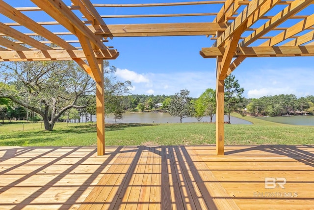 view of patio featuring a deck with water view and a pergola