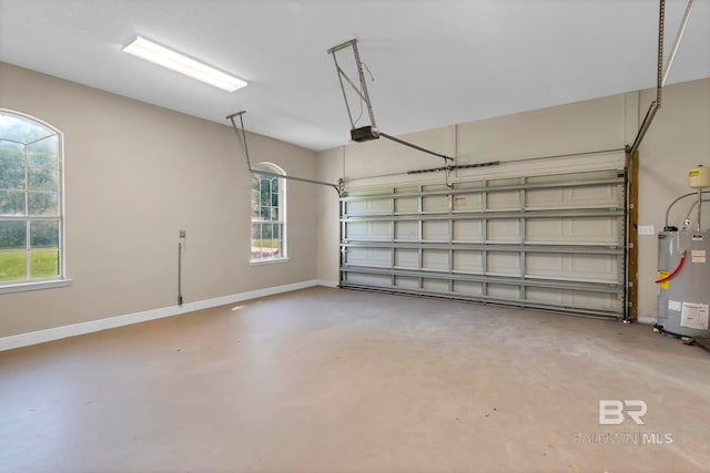 garage with electric water heater, baseboards, and a garage door opener