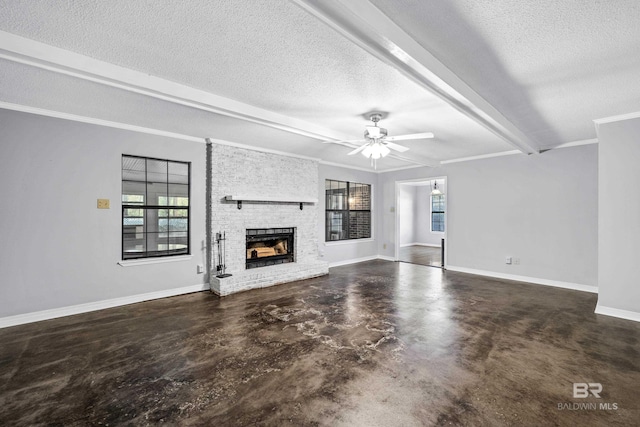 unfurnished living room featuring a textured ceiling, a brick fireplace, ornamental molding, and ceiling fan