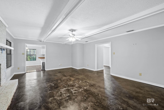 unfurnished living room featuring ceiling fan, a brick fireplace, beamed ceiling, a textured ceiling, and ornamental molding