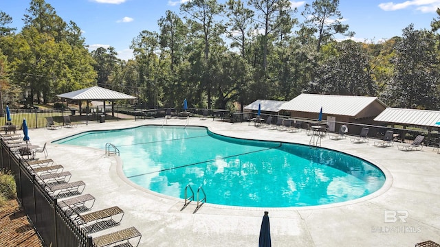 view of pool with a gazebo and a patio