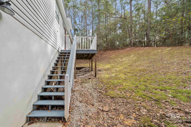 view of yard with a wooden deck