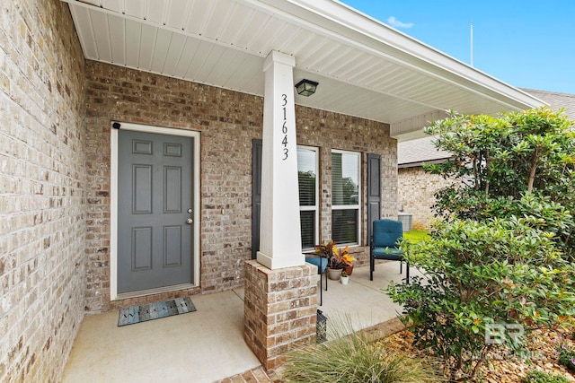 doorway to property with a porch