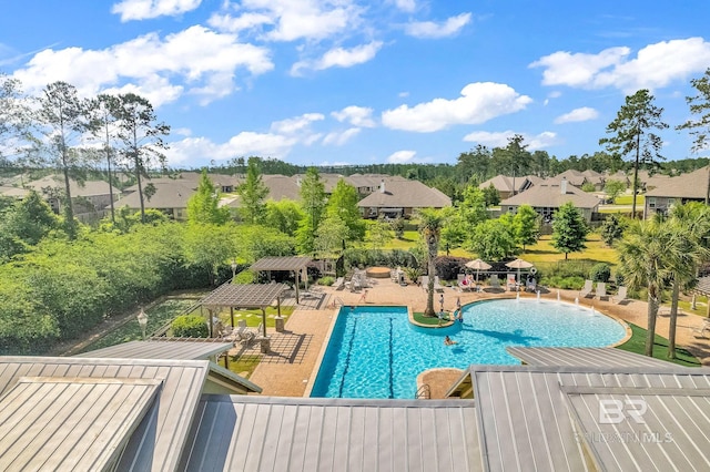 view of swimming pool featuring a patio area and a gazebo