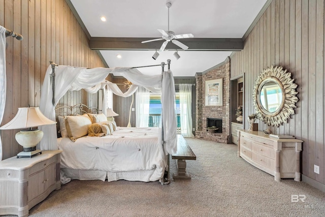 bedroom with light carpet, vaulted ceiling with beams, access to outside, and wood walls