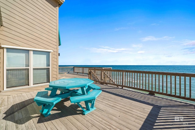 deck featuring a water view