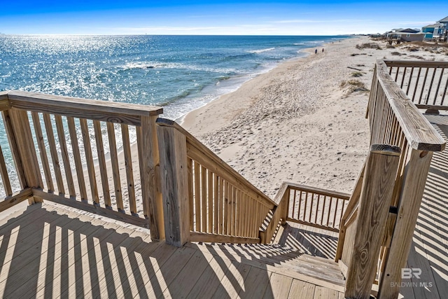 view of water feature with a beach view