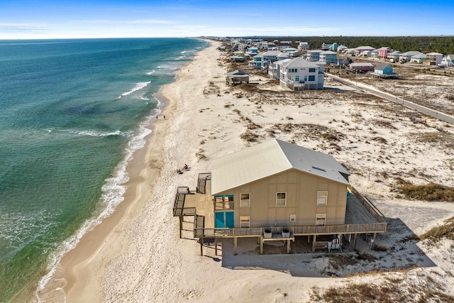 bird's eye view with a beach view and a water view