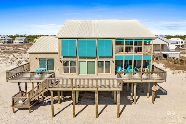 rear view of property with a deck