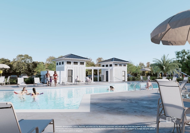 pool with a patio area, an outdoor structure, and fence