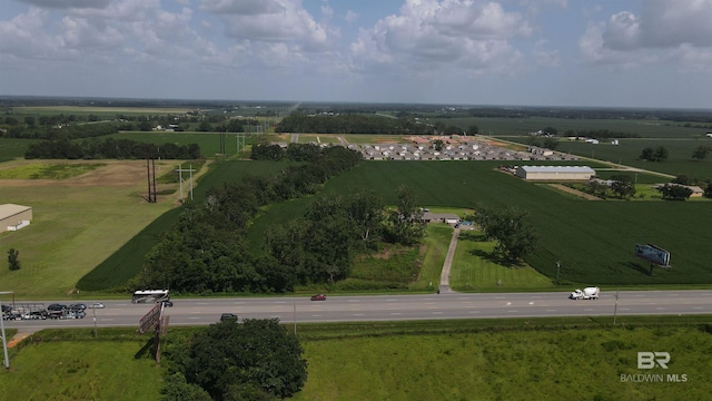 birds eye view of property featuring a rural view