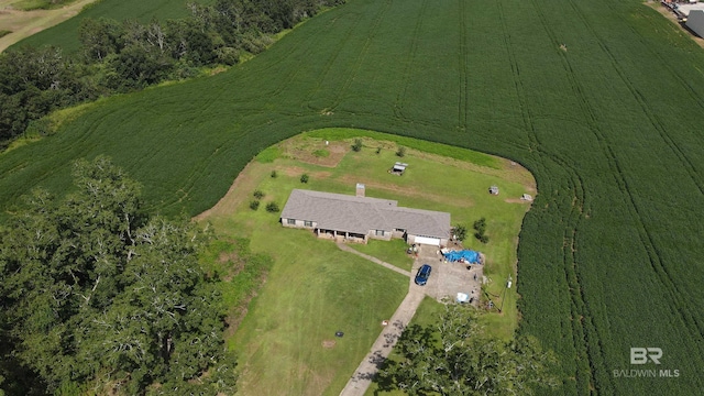 birds eye view of property with a rural view