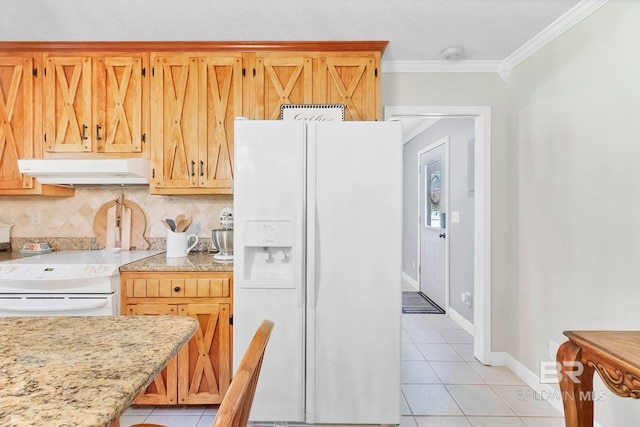 196 Jernigan Rd, Brewton, AL 36426 - kitchen with white appliances, under cabinet range hood, light tile patterned floors, tasteful backsplash, and crown molding
