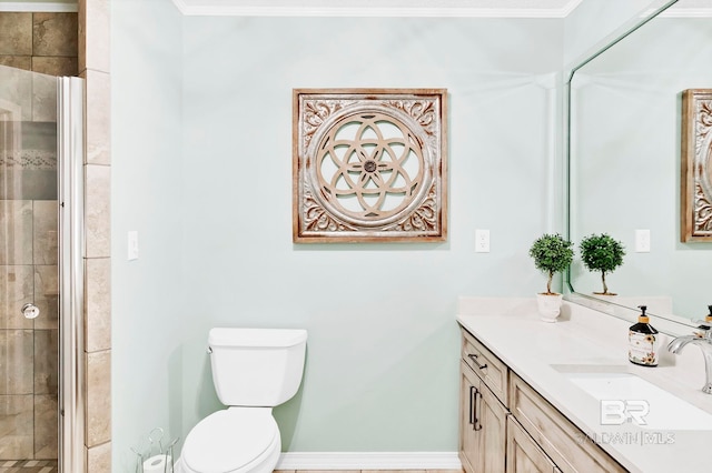 196 Jernigan Rd, Brewton, AL 36426 - bathroom featuring a shower stall, vanity, toilet, and crown molding