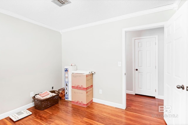 196 Jernigan Rd, Brewton, AL 36426 - spare room featuring ornamental molding, light wood-style floors, and baseboards
