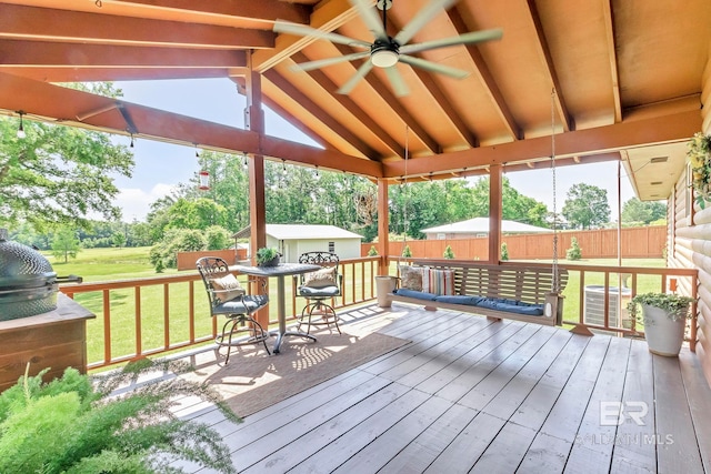 196 Jernigan Rd, Brewton, AL 36426 - deck with an outbuilding, ceiling fan, a shed, and central AC
