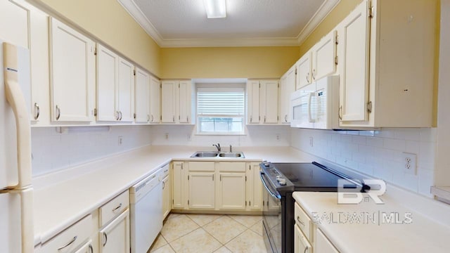 kitchen with white appliances, tasteful backsplash, crown molding, light tile patterned flooring, and sink