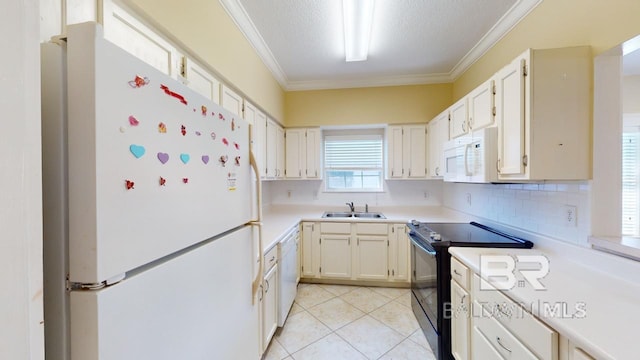 kitchen featuring white appliances, a textured ceiling, decorative backsplash, ornamental molding, and sink