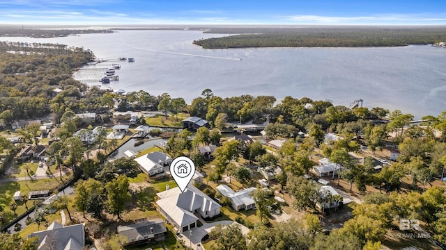 bird's eye view with a water view and a residential view