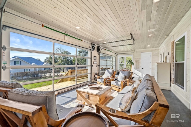 sunroom / solarium featuring wooden ceiling