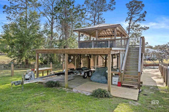 exterior space with a gazebo, stairway, fence, and a wooden deck