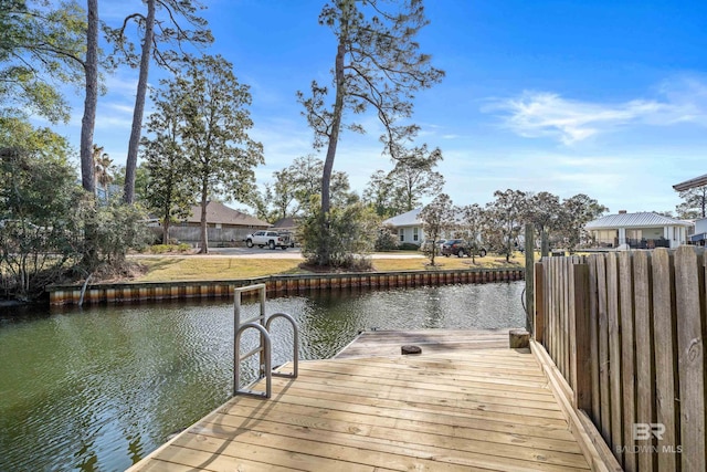 dock area featuring a water view