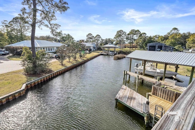 dock area with a water view and boat lift