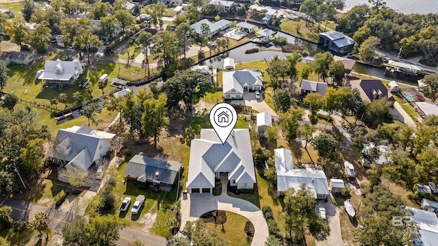 aerial view with a water view and a residential view