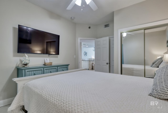 bedroom featuring ceiling fan, a closet, visible vents, and baseboards