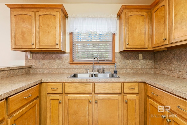 kitchen with sink and backsplash