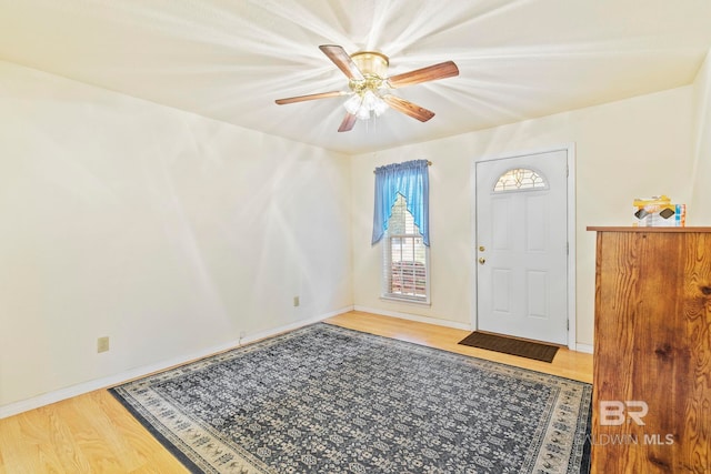 entrance foyer featuring hardwood / wood-style flooring and ceiling fan