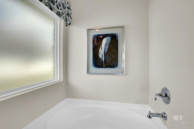 full bath featuring a garden tub