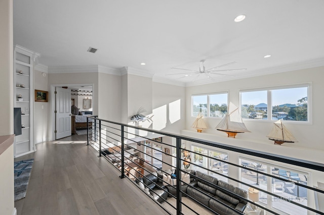 30471 Harbour Dr, Orange Beach, AL 36561 - corridor featuring visible vents, ornamental molding, an upstairs landing, recessed lighting, and wood finished floors