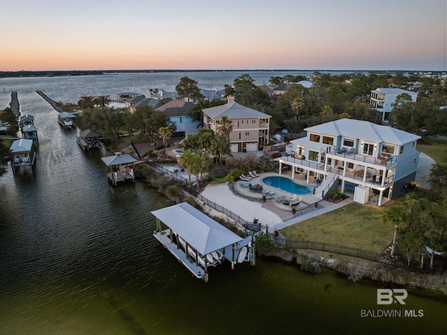 30471 Harbour Dr, Orange Beach, AL 36561 - aerial view at dusk with a water view