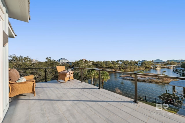 30471 Harbour Dr, Orange Beach, AL 36561 - dock area featuring a balcony and a water view
