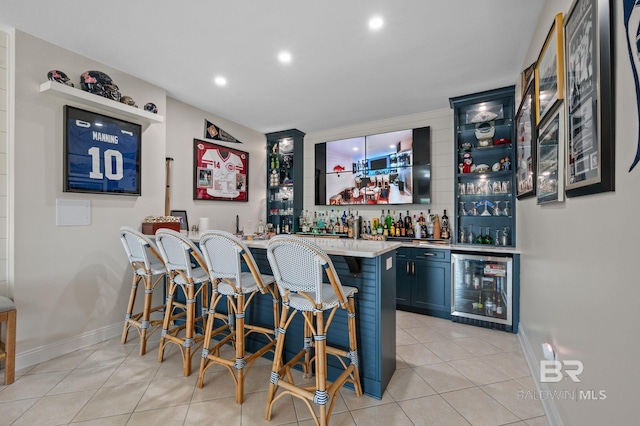 30471 Harbour Dr, Orange Beach, AL 36561 - bar with recessed lighting, wet bar, beverage cooler, and light tile patterned flooring