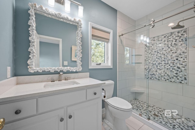 30471 Harbour Dr, Orange Beach, AL 36561 - bathroom with vanity, a shower stall, and toilet