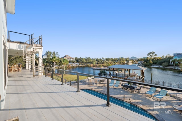 30471 Harbour Dr, Orange Beach, AL 36561 - wooden deck with a gazebo, stairway, and a water view