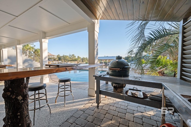 30471 Harbour Dr, Orange Beach, AL 36561 - view of patio featuring an outdoor pool and outdoor wet bar