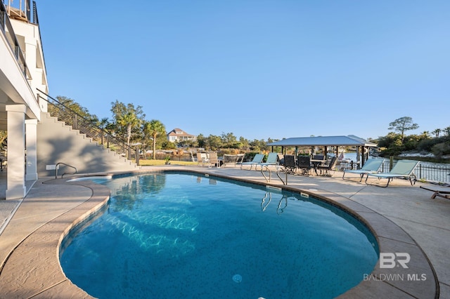 30471 Harbour Dr, Orange Beach, AL 36561 - community pool with a patio and fence