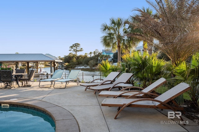 30471 Harbour Dr, Orange Beach, AL 36561 - pool featuring a patio and fence
