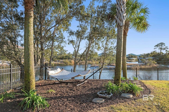 30471 Harbour Dr, Orange Beach, AL 36561 - exterior space featuring a water view and fence