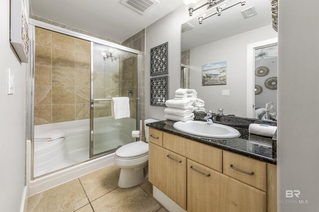 28105 Perdido Beach Blvd Unit C-314, Orange Beach, AL 36561 - bathroom with vanity, tile patterned floors, a shower stall, and visible vents