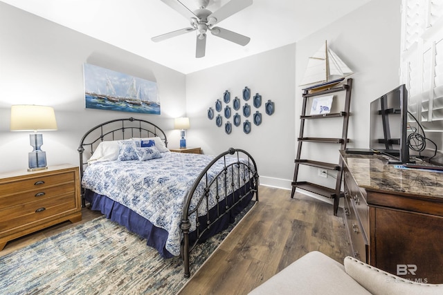 28105 Perdido Beach Blvd Unit C-314, Orange Beach, AL 36561 - bedroom featuring baseboards, ceiling fan, and dark wood-style floors