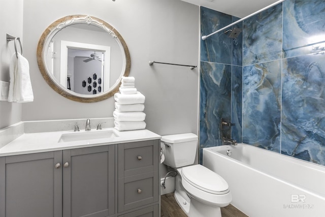 28105 Perdido Beach Blvd Unit C-314, Orange Beach, AL 36561 - bathroom featuring shower / bathing tub combination, a ceiling fan, wood finished floors, vanity, and toilet