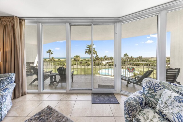 28105 Perdido Beach Blvd Unit C-314, Orange Beach, AL 36561 - entryway featuring tile patterned floors and a wealth of natural light