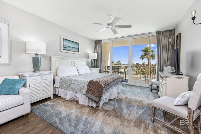 28105 Perdido Beach Blvd Unit C-314, Orange Beach, AL 36561 - bedroom featuring a wall of windows, access to outside, wood finished floors, and ceiling fan