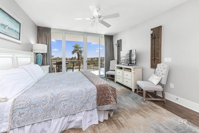 28105 Perdido Beach Blvd Unit C-314, Orange Beach, AL 36561 - bedroom featuring wood finished floors, a wall of windows, baseboards, access to exterior, and a ceiling fan