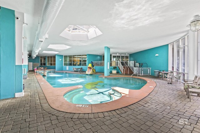 28105 Perdido Beach Blvd Unit C-314, Orange Beach, AL 36561 - pool featuring a skylight and a water slide